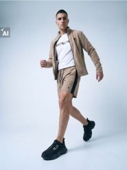 Szorty sportowe SNSY PERFORMANCE - beżowy. Brązowe krótkie spodenki sportowe Sinsay, l, bez wzorów. Za 39.99 zł.