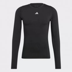 Koszulka męska adidas Techfit Aeroready Long Sleeve Tee. Czarne bielizna termoaktywna Adidas, m, bez wzorów, bez ramiączek, do piłki nożnej. W wyprzedaży za 132.55 zł.