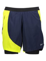 Reebok Szorty w kolorze granatowo-żółtym do biegania rozmiar: M. Niebieskie szorty Reebok, m, bez wzorów. Za 100.99 zł.