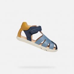 Sandały GEOX B SANDAL STEPPIEUP Niebieski. Niebieskie sandały Geox, ze skóry, bez zapięcia. Za 208.99 zł.
