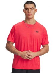 Under Armour Koszulka funkcyjna w kolorze czerwonym rozmiar: S. Czerwone t-shirty sportowe Under Armour, bez wzorów, z materiału, bez ramiączek, outdoorowe. Za 83.03 zł.