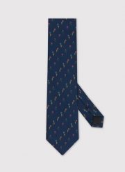 PAKO LORENTE – Granatowy krawat w kolorowe kwiatki. Niebieskie krawaty i muchy Pako Lorente, bez wzorów, z mikrofibry. Za 49.99 zł.