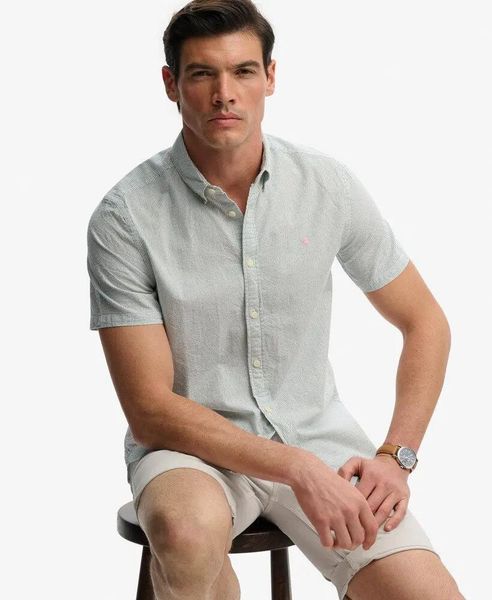 Superdry Koszula Classic Seersucker krótki rękaw – 100% bawełna organiczna. Białe koszule Superdry, na lato, l, bez wzorów, z bawełny, bez kołnierzyka, bez ramiączek. Za 291.00 zł.