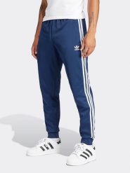 Adidas Spodnie dresowe w kolorze granatowym rozmiar: 3XL. Niebieskie spodnie treningowe długie Adidas, xl, bez wzorów, z dresówki. Za 176.91 zł.