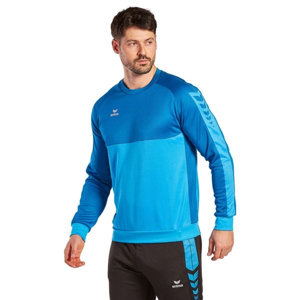 Bluza Erima Six Wings. Niebieskie bluzy Erima, xl, bez wzorów, bez kaptura. W wyprzedaży za 195.00 zł.