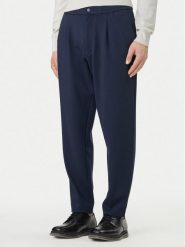 Calvin Klein Spodnie materiałowe LV04LF607G Granatowy Tapered Fit. Niebieskie spodnie materiałowe CALVIN KLEIN, m, bez wzorów, z materiału. Za 529.99 zł.
