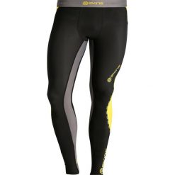 Skins DNAMIC Legginsy black/citron. Spodnie treningowe długie marki Skins, z elastanu. W wyprzedaży za 339.15 zł.