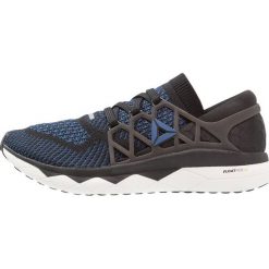 Reebok FLOATRIDE RUN ULTK Obuwie do biegania treningowe black/bunker blue/white. Buty do biegania marki Reebok. Za 649.00 zł.
