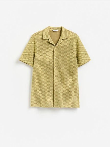 Ażurowa koszula regular - wielobarwny. Koszule Reserved, l, w ażurowe wzory, z bawełny, bez kołnierzyka, bez ramiączek. Za 139.99 zł.