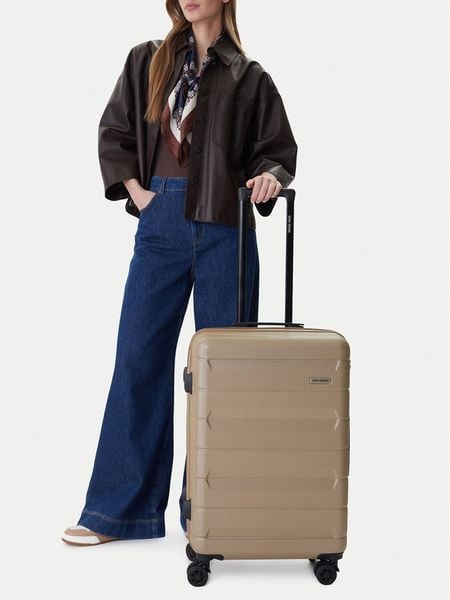 GINO ROSSI Walizka średnia CEO-GIN-M-004-BEIGE Beżowy. Brązowe walizki Gino Rossi, bez wzorów, średnie. Za 299.99 zł.