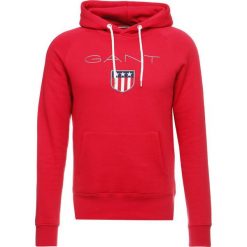GANT SHIELD HOODIE Bluza z kapturem red. Bluzy marki GANT. Za 419.00 zł.