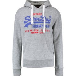 Superdry PREMIUM GOODS DUO HOOD Bluza z kapturem street works grit. Bluzy z kapturem marki Superdry, m, z bawełny, z kapturem. W wyprzedaży za 305.10 zł.