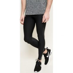 Under Armour - Legginsy. Spodnie treningowe długie marki Under Armour, z dzianiny. W wyprzedaży za 199.90 zł.