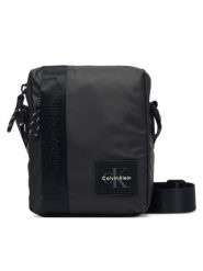 Calvin Klein Saszetka Rubberized Reporter LV04D3480G Czarny. Czarne saszetki i nerki CALVIN KLEIN, bez wzorów, z materiału. Za 329.99 zł.