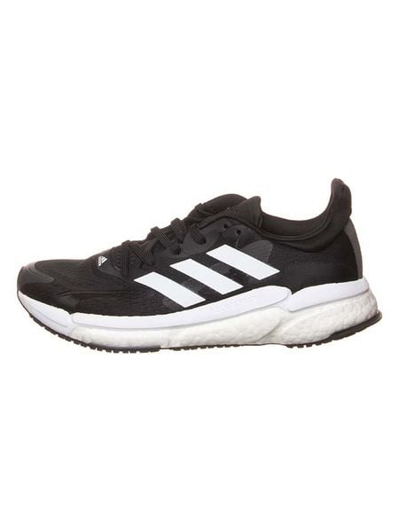 Adidas Buty "Solar Boost 4" w kolorze czarnym do biegania rozmiar: 41 1/3. Czarne buty do biegania Adidas, bez wzorów, bez zapięcia, do biegania. Za 370.69 zł.
