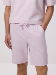 Dresowe szorty regular fit - lawendowy. Fioletowe krótkie spodenki sportowe Reserved, l, bez wzorów, z bawełny. Za 79.99 zł.
