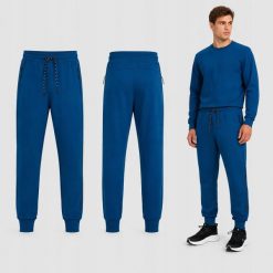 SPODNIE MĘSKIE DRESOWE 4F JOGGERY SPORTOWE ZIELONE. Zielone joggery i bojówki 4F, m, bez wzorów, z bawełny, sportowe. Za 149.99 zł.