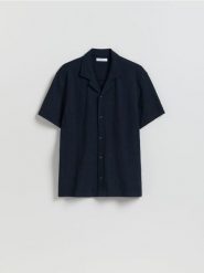 Strukturalna koszula regular fit - granatowy. Niebieskie koszule Reserved, l, bez wzorów, z bawełny, bez kołnierzyka, bez ramiączek. Za 119.99 zł.