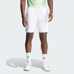 Szorty Tennis Ergo. Białe krótkie spodenki sportowe Adidas, xl, bez wzorów, z elastanu. Za 233.95 zł.