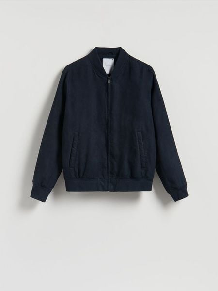 Kurtka bomberka z imitacji zamszu - granatowy. Niebieskie kurtki Reserved, l, bez wzorów, z tkaniny, bez kaptura. W wyprzedaży za 65.99 zł.