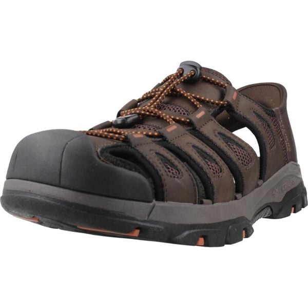 Sandały SKECHERS SLIP - INS TRESMEN NORVICK Brązowy. Brązowe sandały Skechers, z materiału, bez zapięcia. Za 359.99 zł.