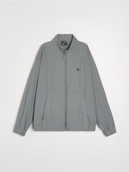 Kurtka wiatrówka SNSY PERFORMANCE - szary. Szare kurtki Sinsay, l, bez wzorów, bez kaptura. Za 89.99 zł.