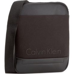 Saszetka CALVIN KLEIN - Caillou Mini Flat Cr K50K502829 001. Saszetki i nerki marki CALVIN KLEIN. W wyprzedaży za 209.00 zł.