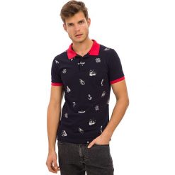 Koszulka polo w kolorze granatowo-czerwonym. Koszulki polo marki Galvanni. W wyprzedaży za 99.95 zł.