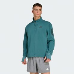 Kurtka Own The Run Winterized. Niebieskie kurtki Adidas, xl, bez wzorów, bez kaptura. Za 439.00 zł.