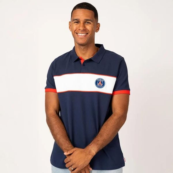 PSG polo męskie. Niebieskie koszulki polo PARIS SAINT GERMAIN, l, bez wzorów, bez kołnierzyka, bez ramiączek, do piłki nożnej. Za 214.99 zł.