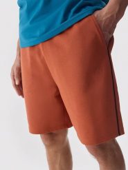 4F Szorty dresowe w kolorze ceglanym rozmiar: XXL. Czerwone krótkie spodenki sportowe 4F, xxl, bez wzorów, z bawełny. Za 57.06 zł.