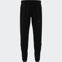 Spodnie piłkarskie ADIDAS Tiro Travel 26 treningowe. Spodnie treningowe długie Adidas, l, bez wzorów, z dresówki. Za 289.99 zł.