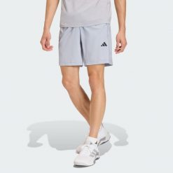 Tkane Szorty Do Ćwiczeń Essentials Base. Szare szorty Adidas, bez wzorów, sportowe. Za 119.00 zł.
