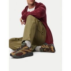 Buty do biegania Reebok. Brązowe buty do biegania Reebok, bez wzorów, bez zapięcia, do biegania. Za 359.99 zł.