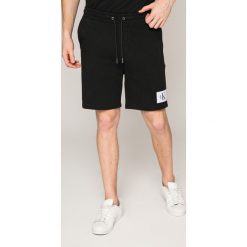 Calvin Klein Jeans - Szorty. Szare szorty marki Calvin Klein Jeans, z bawełny, casualowe. W wyprzedaży za 199.90 zł.