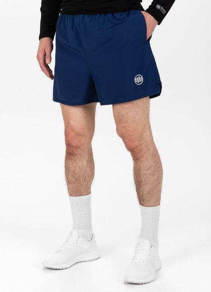 Spodenki treningowe męskie Pitbull West Coast Performance Small Logo. Niebieskie krótkie spodenki sportowe PITBULL, m, bez wzorów, z materiału. Za 139.00 zł.