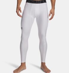 Under Armour UA HG ARMOUR LEGGINGS Legginsy męskie. Białe legginsy długie sportowe Under Armour, l, bez wzorów, z elastanu, na fitness i siłownię. W wyprzedaży za 125.99 zł.