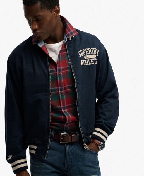Superdry Kurtka Bomber Twill Varsity z mieszanki bawełny. Niebieskie kurtki Superdry, m, bez wzorów, z bawełny, bez kaptura. Za 366.40 zł.