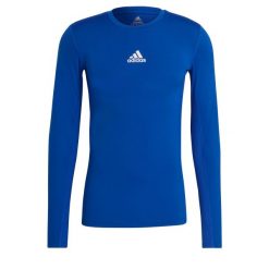 Koszulka męska adidas Compression Long Sleeve Tee. Niebieskie bielizna termoaktywna Adidas, m, bez wzorów, bez ramiączek, do piłki nożnej. Za 99.99 zł.