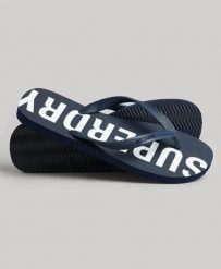 Superdry Code Core Sport Klapki gumowe – Eclipse Navy/Optic. Niebieskie klapki Superdry, z gumy. Za 116.60 zł.