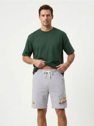 Szorty dresowe Los Angeles Lakers NBA - szary. Szare krótkie spodenki sportowe Sinsay, l, bez wzorów, z dresówki. Za 69.99 zł.