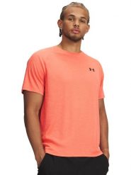 Under Armour Koszulka sportowa "Tech" w kolorze pomarańczowym rozmiar: XL. Pomarańczowe t-shirty sportowe Under Armour, bez wzorów, z materiału, bez ramiączek, outdoorowe. Za 87.99 zł.