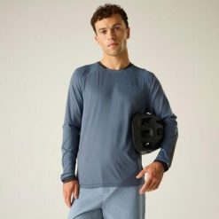 Dżersej z długim rękawem Dare 2B Trackstand Ace. Niebieskie bluzy Dare 2B, bez wzorów, z dżerseju, bez kaptura. Za 249.99 zł.