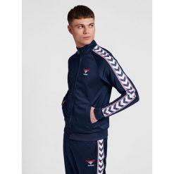Bluza dresowa zapinana na zamek błyskawiczny Hummel IC Lerby Poly. Niebieskie bluzy Hummel, m, bez wzorów, z dresówki, bez kaptura. Za 287.00 zł.