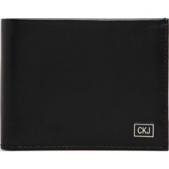 Calvin Klein Jeans - Portfel skórzany. Czarne portfele Calvin Klein Jeans, bez wzorów, z jeansu. W wyprzedaży za 189.90 zł.