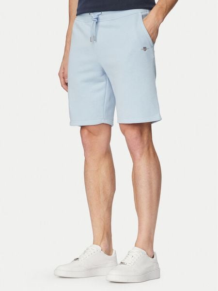 Gant Szorty sportowe 2009027 Niebieski jasny Regular Fit. Niebieskie krótkie spodenki sportowe GANT, l, bez wzorów, z bawełny. Za 322.99 zł.