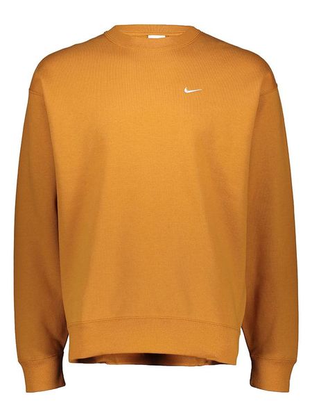 Nike Bluza "Solo Swoosh" w kolorze żółtym rozmiar: XS. Żółte bluzy Nike, xs, bez wzorów, bez kaptura. Za 109.00 zł.