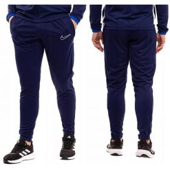 Spodnie Dresowe Męskie Nike Dri-Fit Academy 25 Sportowe Dresy Wygodne. Niebieskie spodnie treningowe długie Nike, m, bez wzorów, z dresówki. Za 141.99 zł.