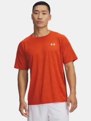 Under Armour Koszulka funkcyjna w kolorze pomarańczowym rozmiar: 3XL. Pomarańczowe t-shirty sportowe Under Armour, bez wzorów, z materiału, bez ramiączek, outdoorowe. Za 104.89 zł.