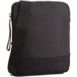 Saszetka CALVIN KLEIN - Shadow Flat Crossove K50K503907 001. Saszetki i nerki marki CALVIN KLEIN. W wyprzedaży za 249.00 zł.